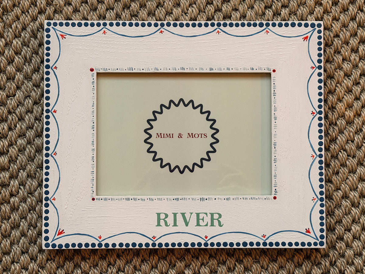 Mimi & Mots personalised blue photoframe.  Blue design with a contrast of red. 
