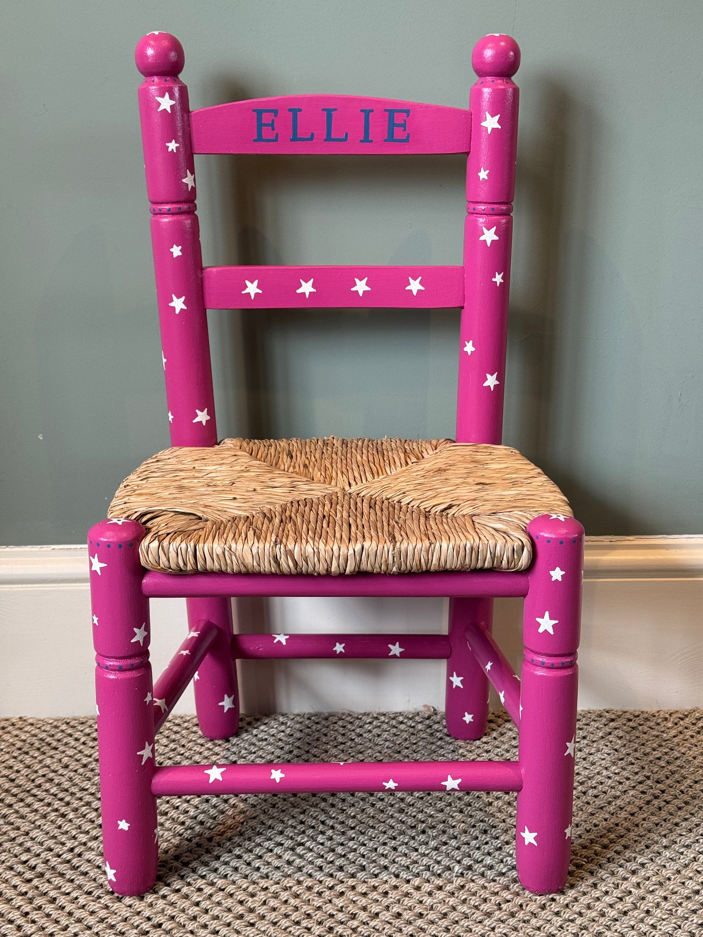 Personalised hand-painted children's chair in dark pink with cream stars and child's name — Ellie Chair by Mimi & Mots