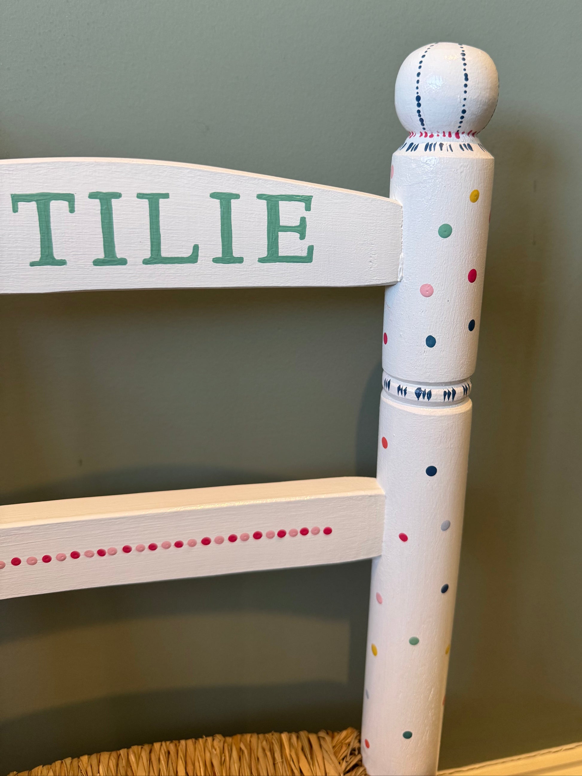 Front view of hand-painted personalised children's wooden chair with woven rush seat — Ottilie Chair by Mimi & Mots