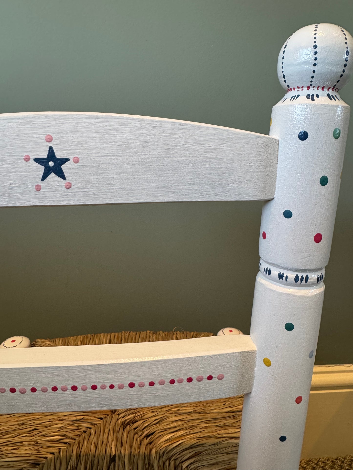 Close-up of hand-painted detail on personalised children's chair, handmade in the UK — Mimi & Mots