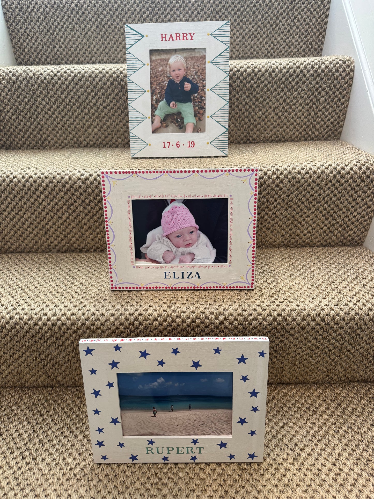 Personalised hand-painted children's photo frames in portrait orientation — green geometric, pink design and star designs by Mimi & Mots
