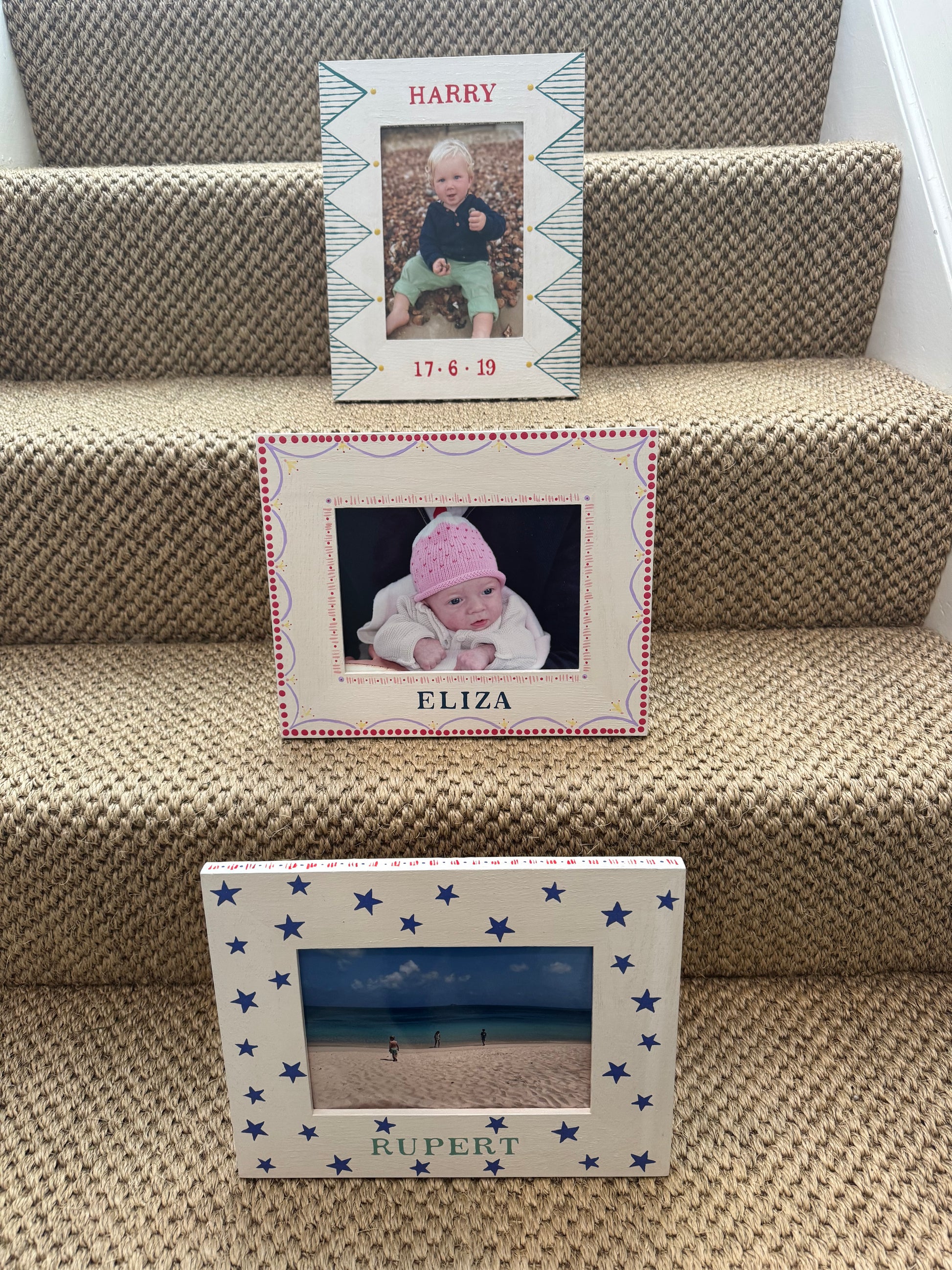 Personalised hand-painted children's photo frames in portrait orientation — green geometric, pink design and star designs by Mimi & Mots