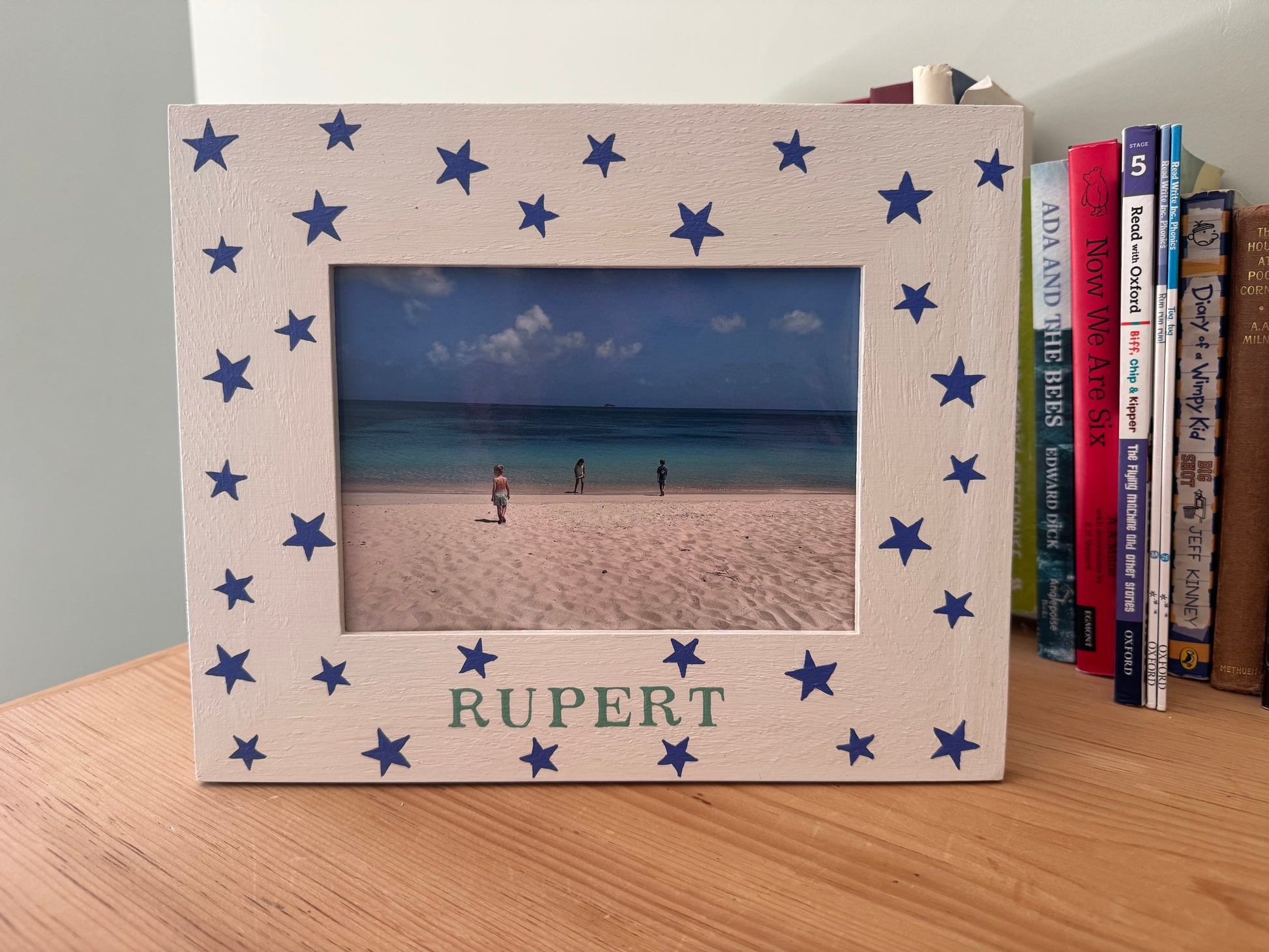 Personalised oak photo frame with star pattern in landscape orientation — handmade children's gift by Mimi & Mots